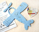 Recycled Ideas Favors plantable paper blue airplane with card and map heart
