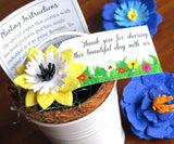Recycled Ideas Favors daffodil flower seed paper in a white tin pail