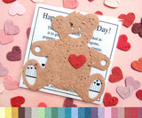 Recycled Ideas Favors cellophane bag with a plantable paper teddy bear and hearts