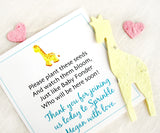 Recycled Ideas Favors plantable paper giraffe with card and mini hearts