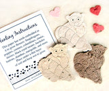 Recycled Ideas Favors plantable paper lemurs with card and mini hearts