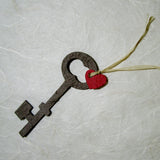 plantable skeleton key with red heart
