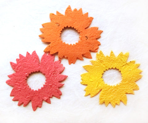 Recycled Ideas Favors plantable paper sunflowers in red, orange and gold