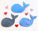 Recycled Ideas Favors plantable paper blue whales with mini hearts