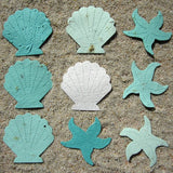 Recycled Ideas Favors aqua and white plantable paper shells and starfish