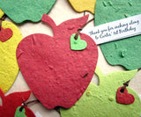 Recycled Ideas Favors plantable paper red, green and yellow apples with tied-on mini heart and tag