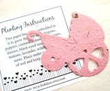 Recycled Ideas Favors plantable paper pink baby carriage with card