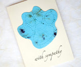 Handmade pet sympathy card with forget-me-not seed embedded plantable paper paw