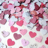 Recycled Ideas Favors plantable paper mini hearts in reds, pinks and white