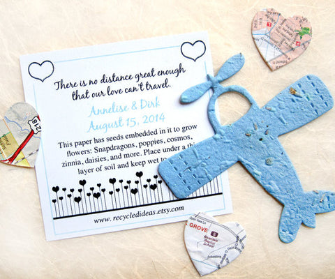 Recycled Ideas Favors plantable paper blue airplane with card and map hearts