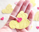 Recycled Ideas Favors plantable paper bees and hearts