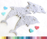Recycled Ideas Favors plantable paper dolphins with mini hearts